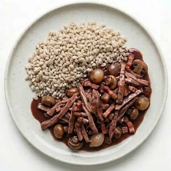 Coq au vin chicken with pearl barley